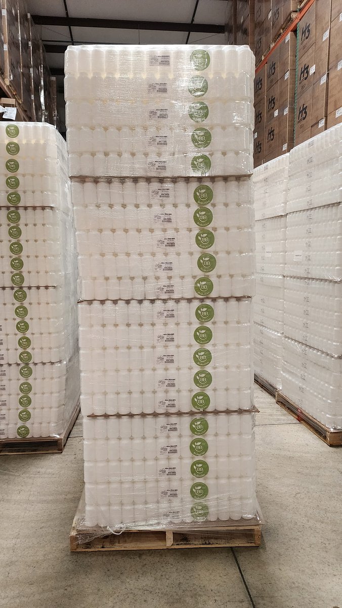 Stack of BioBottles on a pallet in a factory
